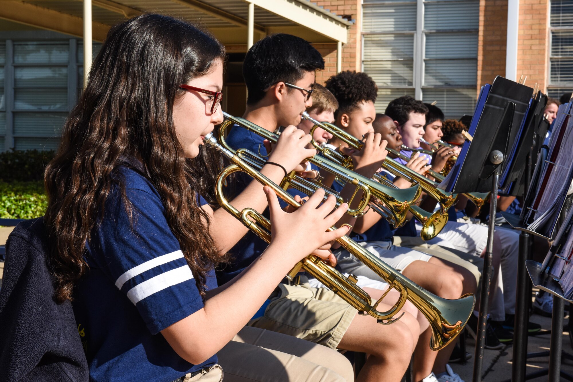 The Green Acres Middle School band performs the national anthem during Purple-Up Day in Bossier City, La., April 7, 2017. Senators, school superintendents, congressmen, and base personnel attended to show their appreciation to the military child. (U.S. Air Force photo/Senior Airman Luke Hill)