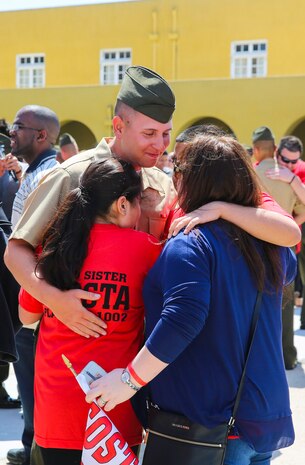 The new Marines of Alpha Company, 1st Recruit Training Battalion, embrace their loved ones during liberty call at Marine Corps Recruit Depot San Diego, today.
After nearly thirteen weeks of training, the Marines of Alpha Company will officially graduate from recruit training tomorrow.