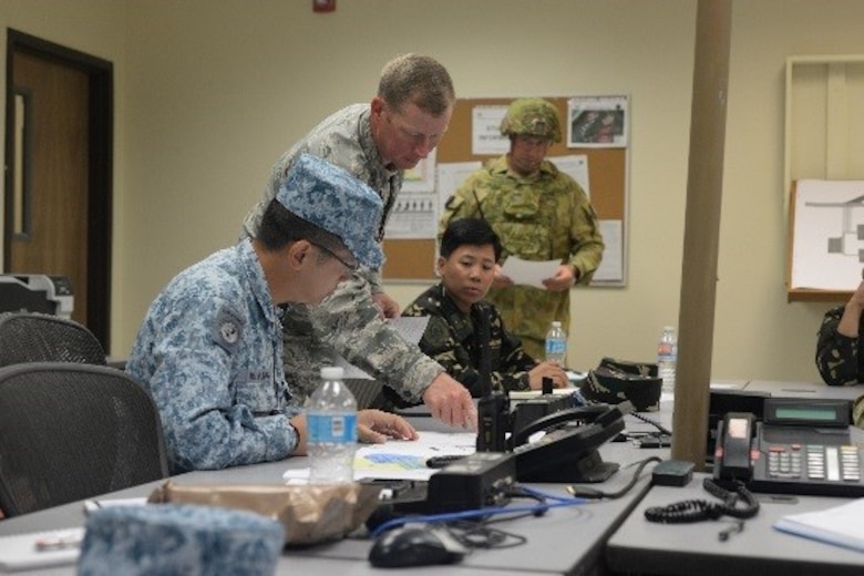 Airmen from multiple nations conduct command and control training Feb. 14, 2017, at Andersen Air Force Base, Guam. The 554th RED HORSE Silver Flag flight hosted the Republic of Singapore Air Force, Royal Australian Air Force and Philippine Air Force for a week-long training event to learn to work cohesively while also trading technical knowledge. (Courtesy photo)