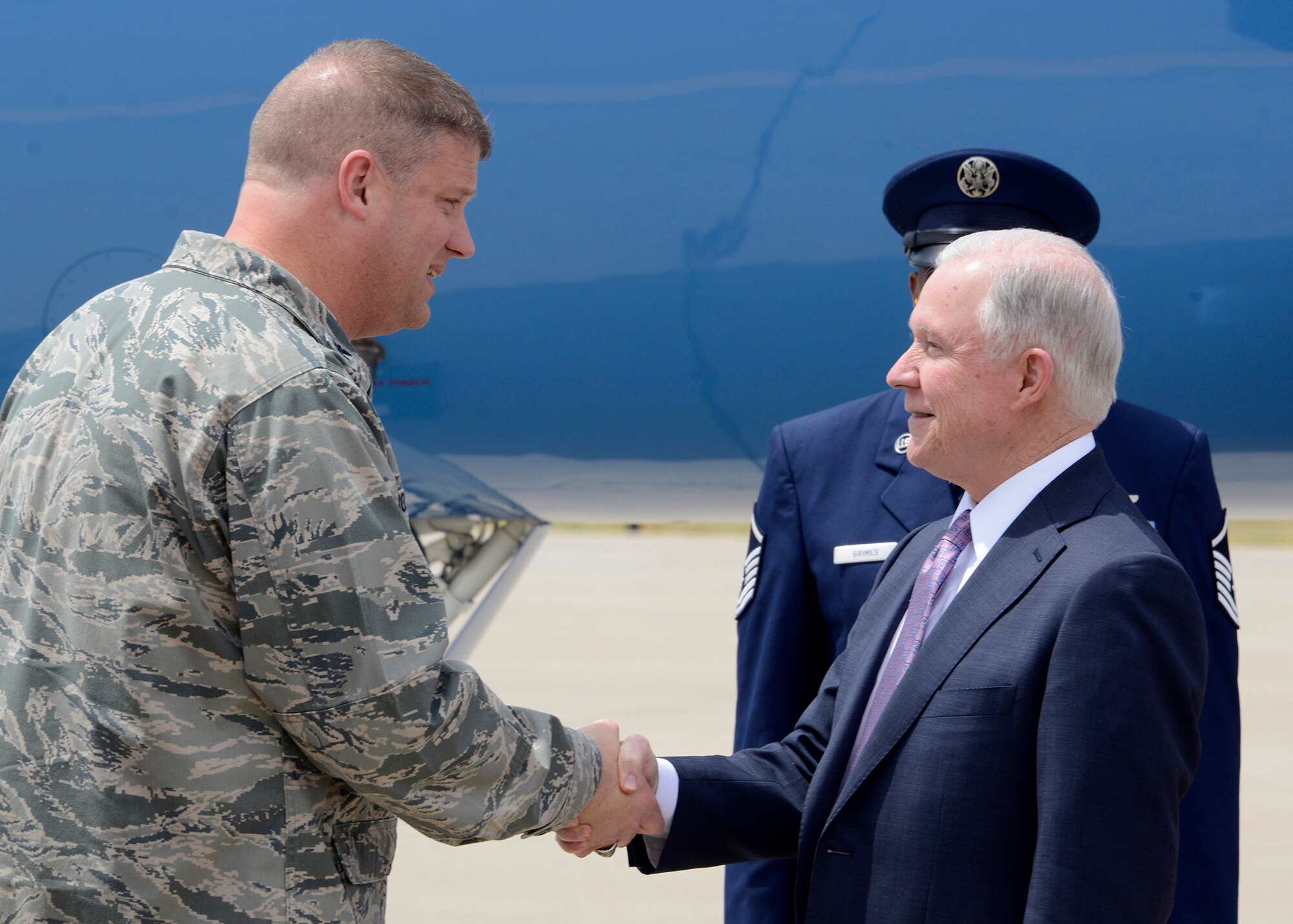 Attorney General of the United States Jefferson Sessions III shakes hands with Col. David Shoemaker, 56th Fighter Wing vice commander, after landing April 11, 2017, at Luke Air Force Base, Ariz. During his visit, Sessions held an all-call for Airmen discussing veteran’s rights.  (U.S. Air Force photo by Senior Airman Devante Williams)