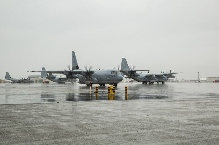 A U.S. Marine Corps KC-130J Hercules with Marine Aerial Refueler Transport Squadron (VMGR) 152, taxis to the flight line during aviation delivered ground refueling training with Marine Fighter Attack Squadron (VMFA) 121 at Marine Corps Air Station Iwakuni, Japan, April 11, 2017. The ADGR marked the first evolution of this form of refueling for VMFA-121’s F-35B Lightning II aircraft, and it increases the squadron’s ability to refuel by C-130 aircraft in austere locations when other resources may not be available.  (U.S. Marine Corps photo by Lance Cpl. Joseph Abrego)
