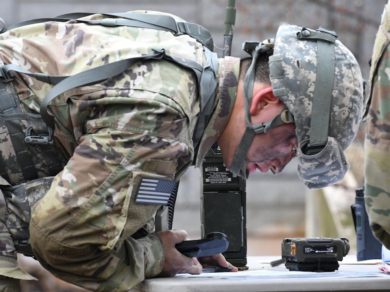 U.S. Army Pfc. Sung Hoon Lee, 2nd Battalion, 1st Air Defense Artillery medic, sends a simulated medevac request during the 35th Air Defense Artillery Brigade Expert Field Medical Badge preliminary competition at Osan Air Base, Republic of Korea, April 6, 2017. The goal of the competition was to bring together medics for training and determine which have the ability and resolve to win at the 8th Army’s Expert Field Medical Badge Competition. (U.S. Air Force photo by Staff Sgt. Alex Fox Echols III)