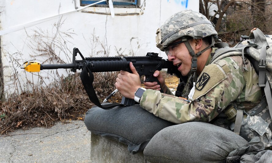 U.S. Army Staff Sgt. Santiago Sendejas, 6th Battalion, 52nd Air Defense Artillery medical NCO in charge, fights off simulated attackers during the 35th Air Defense Artillery Brigade Expert Field Medical Badge preliminary competition at Osan Air Base, Republic of Korea, April 6, 2017. The competition was a first for the 35th ADA, and it gave Soldiers an opportunity to flush out their weaknesses and capitalize on their strengths in the field medic realm. (U.S. Air Force photo by Staff Sgt. Alex Fox Echols III)