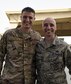 U.S. Air Force 1st Lt. Devin Ricchuito, a clinical nurse with the 455th Expeditionary Medical Group, poses for a photo with his father U.S. Air Force Chief Master Sgt. Shawn Ricchuito, fire chief with the 379th Expeditionary Civil Engineer Squadron Fire Department, at Al Udeid Air Base, Qatar, April 10, 2017. (U.S. Air Force photo by Senior Airman Cynthia A. Innocenti)