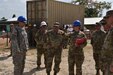 Master Sgt. Jennifer Trumbull, attached to the 672nd Engineer Company from Missoula, Montana, briefs BG Alberto C Rosende and other senior leaders on their work project during Beyond the Horizon: 2017-Belize, April 6. During their rotation, U.S. Army Reserve Soldiers laid the foundation for the new, three classroom addition to the St. Matthews Government School.