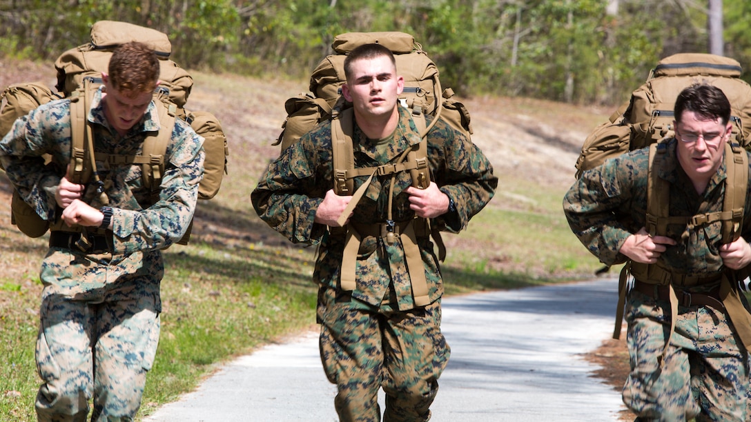 Marines conduct a timed 20 kilometer ruck run during a scout sniper screener at Marine Corps Base Camp Lejeune, N.C., April 3, 2017. The screener tested the Marines physical and mental limits through rigorous training. The Marines are with 2nd Battalion, 8th Marine Regiment, 2nd Marine Division. 