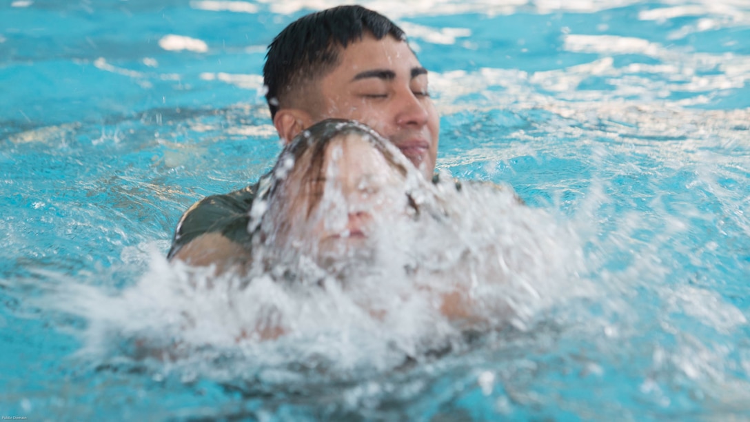 Marines practice rescue techniques during Water Survival-Advanced training at Marine Corps Base Camp Lejeune, N.C., April 4, 2017. WSA provides Marines the opportunity to become qualified rescue swimmers. The Marines are students in the course, which is run by 2nd Law Enforcement Battalion. 