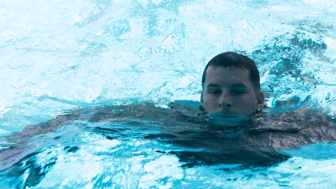 A Marine completes a 600 meter conditioning swim during Water Survival-Advanced training at Marine Corps Base Camp Lejeune, N.C., April 4, 2017. WSA is a week-long course that tests Marines on rescues, strokes and distance swimming. The Marine is a student in the course, which is run by 2nd Law Enforcement Battalion.