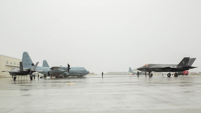 Two U.S. Marine Corps F-35B Lightning II aircraft with Marine Fighter Attack Squadron 121 refuel using a KC-130J Hercules with Marine Aerial Refueler Transport Squadron 152 during aviation delivered ground refueling training at Marine Corps Air Station Iwakuni, Japan, April 11, 2017. The ADGR marked the first evolution of this form of refueling for VMFA-121’s F-35B Lightning II aircraft, and it increases the squadron’s ability to refuel by C-130 aircraft in austere locations when other resources may not be available. 