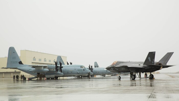 A U.S. Marine Corps F-35B Lightning II aircraft with Marine Fighter Attack Squadron 121 refuels using a KC-130J Hercules with Marine Aerial Refueler Transport Squadron 152 during aviation delivered ground refueling training at Marine Corps Air Station Iwakuni, Japan, April 11, 2017. The ADGR marked the first evolution of this form of refueling for VMFA-121’s F-35B Lightning II aircraft, and it increases the squadron’s ability to refuel by C-130 aircraft in austere locations when other resources may not be available. 
