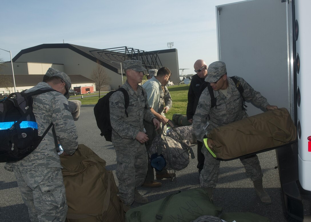 Friends and family welcome home 46th Aerial Port Squadron Airmen from their deployment, April 11, 2017. The aerial porters recently completed their 6-month deployment to Southwest Asia. (U.S. Air Force Photo/Tech. Sgt. Nathan Rivard)