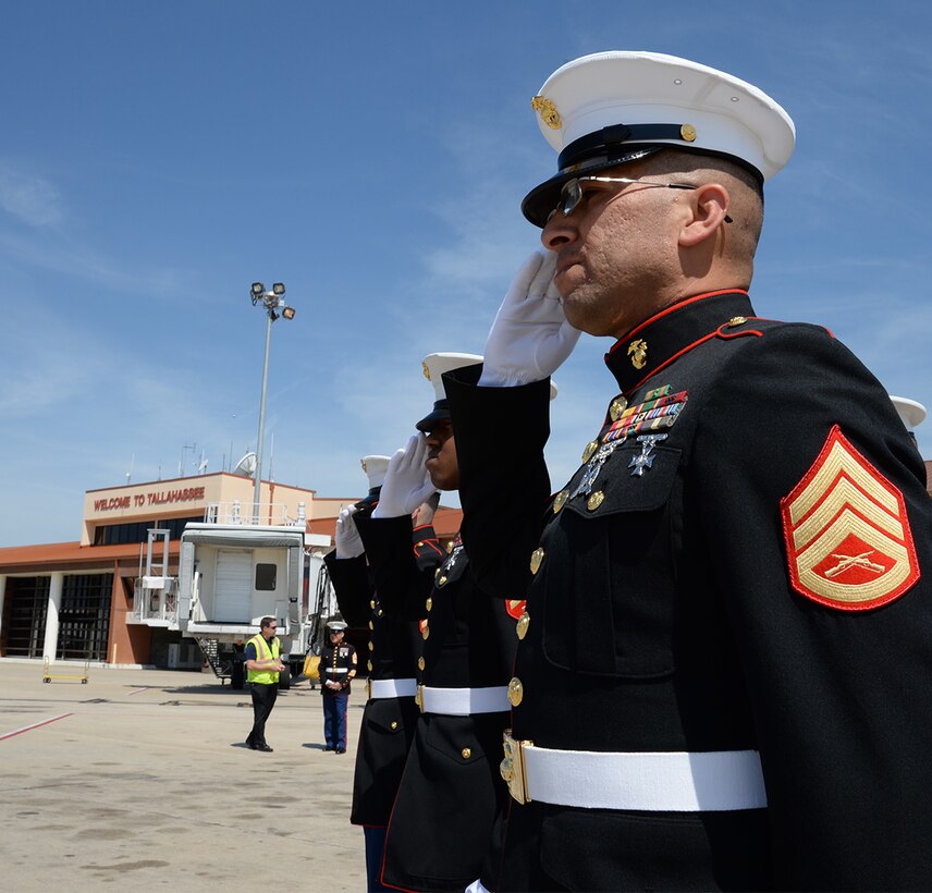 Marine Corps Logistics Base Albany Marines conduct plane-side honors for fallen Marine Pfc. James O. Whitehurst at the Tallahassee International Airport in Tallahassee, Fla., April 11. Whitehurst was killed in action Nov. 20, 1943, at the battle of Tarawa during World War II. 