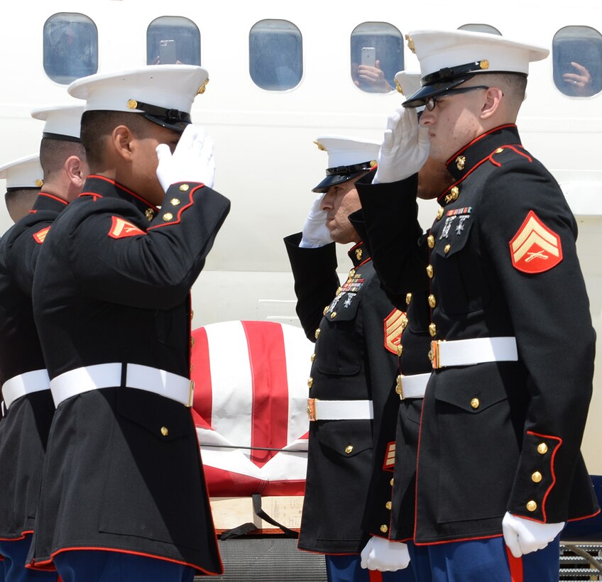 Marine Corps Logistics Base Albany Marines conduct plane-side honors for fallen Marine Pfc. James O. Whitehurst at the Tallahassee International Airport in Tallahassee, Fla., April 11. Whitehurst was killed in action Nov. 20, 1943, at the battle of Tarawa during World War II. 