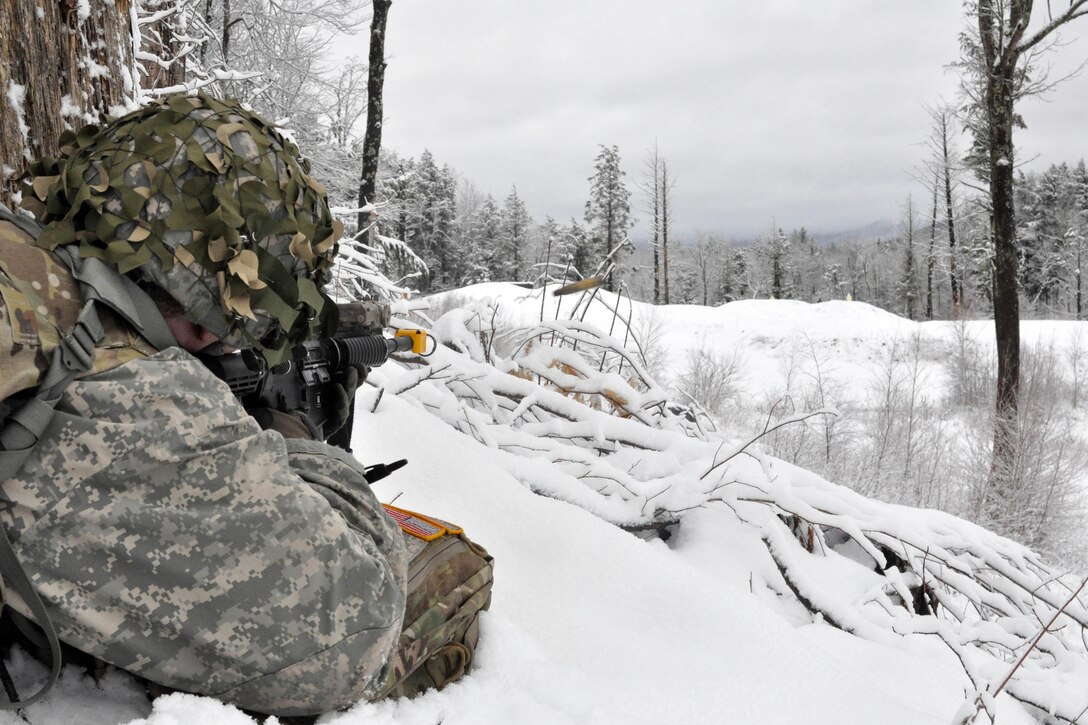 A soldier fires blank rounds at targets downrange at Camp Ethan Allen Training Site in Jericho, Vt., April 8, 2017. Army National Guard photo by Staff Sgt. Ashley Hayes