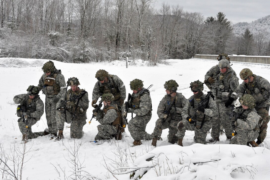 Soldiers clear their weapons after completing squad-level training at Camp Ethan Allen Training Site in Jericho, Vt., April 8, 2017. The soldiers conducted assault team and support by fire team exercises. Army National Guard photo by Staff Sgt. Ashley Hayes