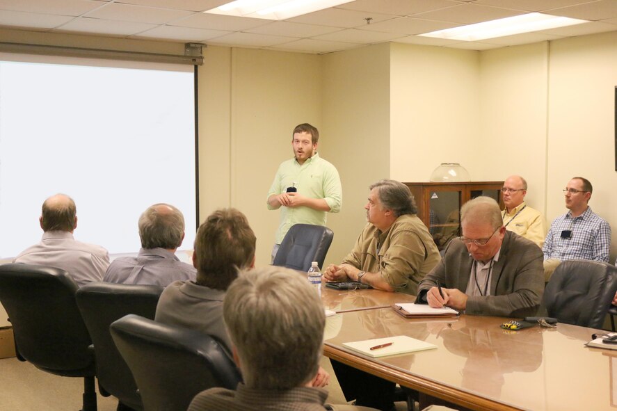 During an innovation meeting held March 21 at the AEDC Model and Machine Shop, engineer Justin Garrard discusses a new technology that will determine the asset health of large electric motors at AEDC. (U.S. Air Force photo/Deidre Ortiz) 