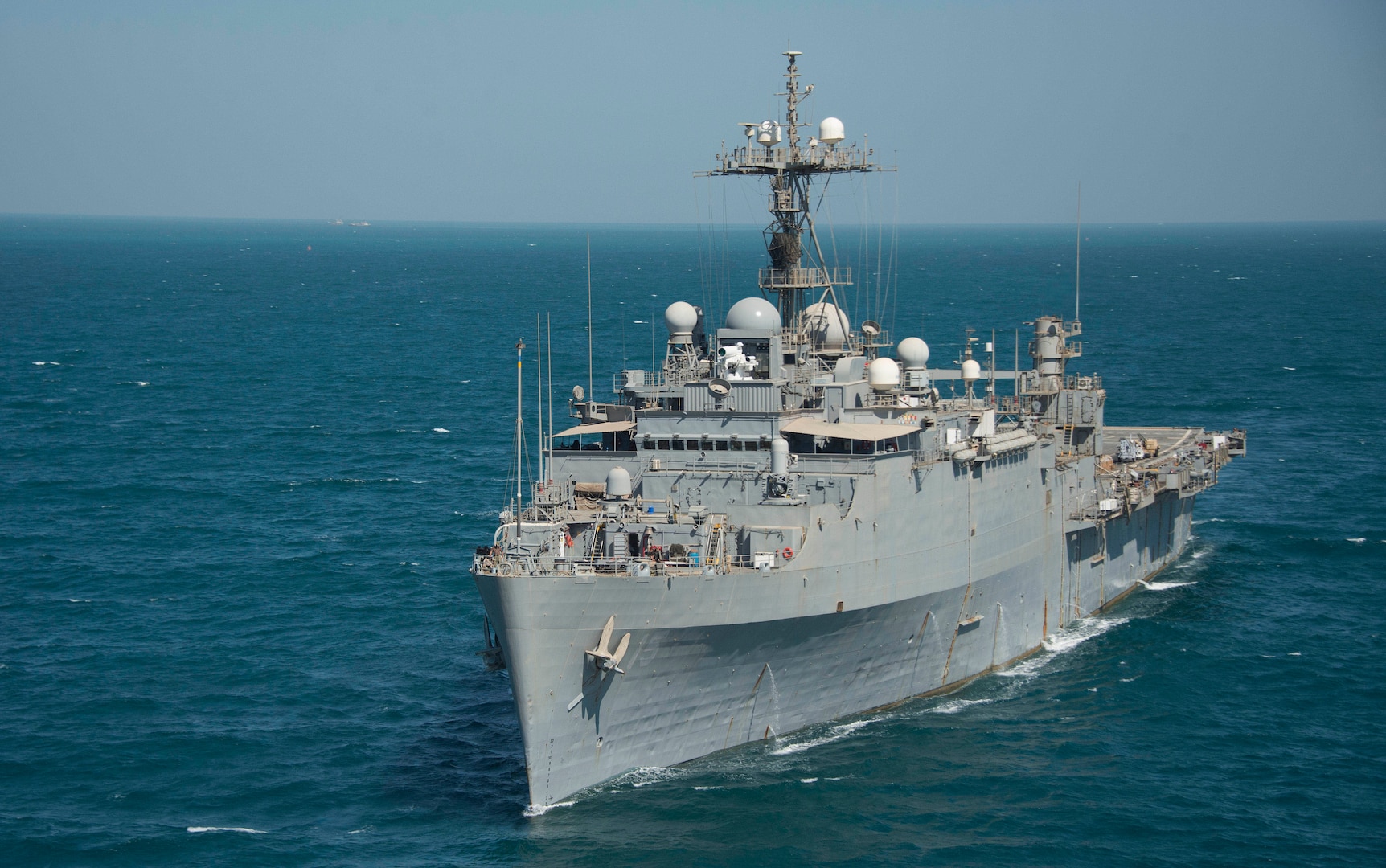 Official U.S. Navy file photo of the afloat forward staging base (interim) USS Ponce (AFSB(I) 15) transiting the Arabian Gulf. Ponce is equipped with the Laser Weapon System (LaWS), a technology demonstrator built by Naval Surface Warfare Center Dahlgren Division (NSWCDD). LaWS can be directed onto targets from the radar track obtained from an MK 15 Phalanx Close-In Weapon System or other targeting sources. NSWCDD engineer Alan Tolley - the chief engineer of all surface Navy radars, including radars used by LaWS aboard the Ponce - was selected as a National Society of Professional Engineers' (NSPE) 2015 Federal Engineer of the Year Award (FEYA) Agency winner, NSWCDD announced Dec. 10. Tolley was commended for his key role in delivering vital warfare capabilities to the Fleet. The FEYA is selected by a panel of judges established by National Society of Professional Engineers (NSPE) professional engineers in government who consider engineering achievements, education, continuing education, professional/technical society activities, NSPE membership, awards and honors, and civic and humanitarian activities.