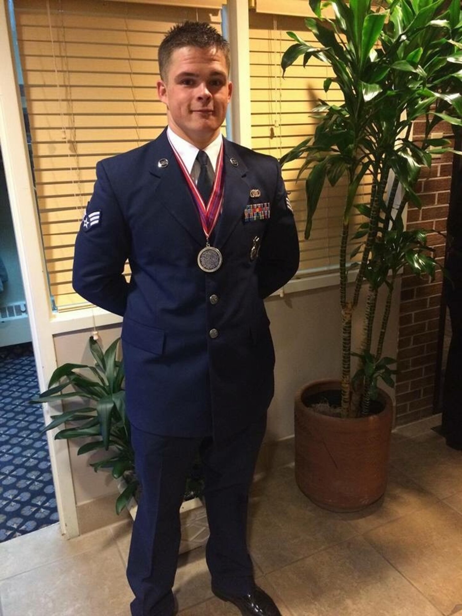 PETERSON AIR FORCE BASE, Colo. – Senior Airman Austin Bieren, 21st Space Wing security forces Airman, poses for a photo during an Airman Leadership Graduation, at Peterson Air Force Base, Colo. On March 28, 2017, Staff Sgt. Austin Bieren died in a non-combat related incident while deployed in support of combat operations. (Courtesy Photo)