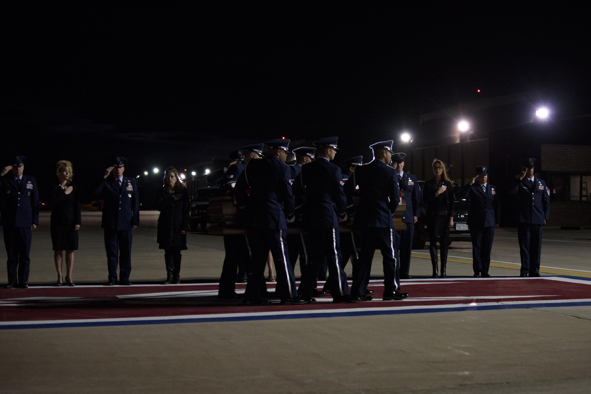 PETERSON AIR FORCE BASE, Colo. – Airmen with the Peterson Air Force Base’s Honor Guard transfer the remains of Staff Sgt. Austin Bieren, a 21st Space Wing security forces Airman of Umatilla, Ore., April 7, 2017, at Peterson AFB, Colo. Bieren died in a non-combat related incident while deployed in support of combat operations March 28, 2017. (U.S. Air Force photo by Airman 1st Class Dennis Hoffman) 