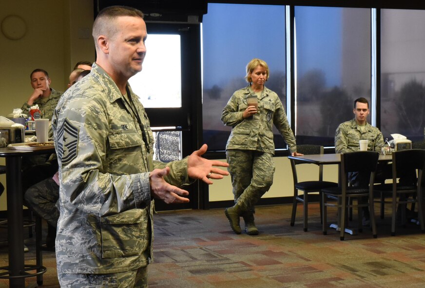Chief Master Sgt. Jason Tiek, 50th Space Wing Command Chief, talks with Airmen during a quarterly NCO breakfast at Schriever Air Force Base, Colorado, Tuesday, April 11, 2017.  Tiek spoke about the importance of feedback from NCOs.  (U.S. Air Force photo/Tech. Sgt. Sara Bishop)