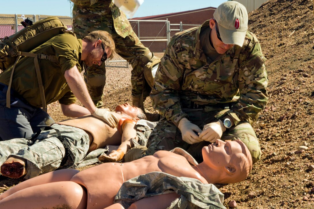 Special operations medics assess simulated casualties during training at Fort Carson, Colo., April 6, 2017. Army photo by Staff Sgt. Will Reinier