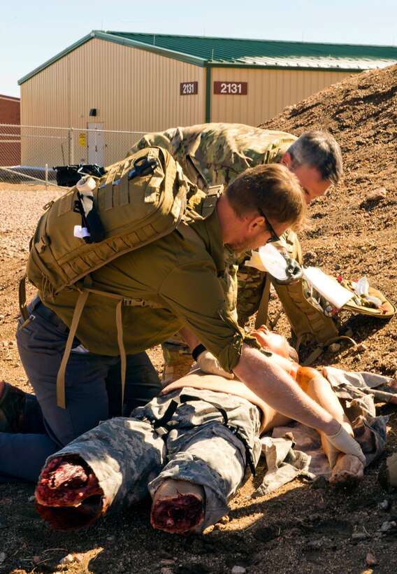 Special operations medics assess a simulated casualty during a training exercise at Fort Carson, Colo., April 6, 2017. Army photo by Staff Sgt. Will Reinier