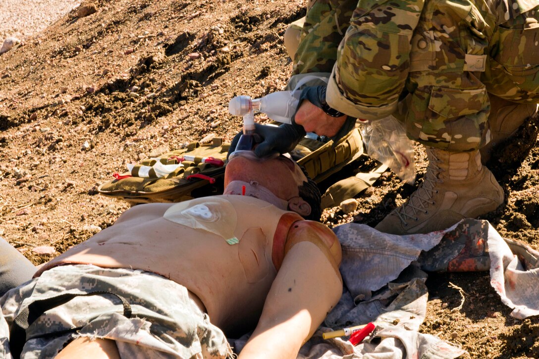 A special operations medic applies a bag-valve mask to a simulated casualty during a training exercise at Fort Carson, Colo., April 6, 2017. Army photo by Staff Sgt. Will Reinier