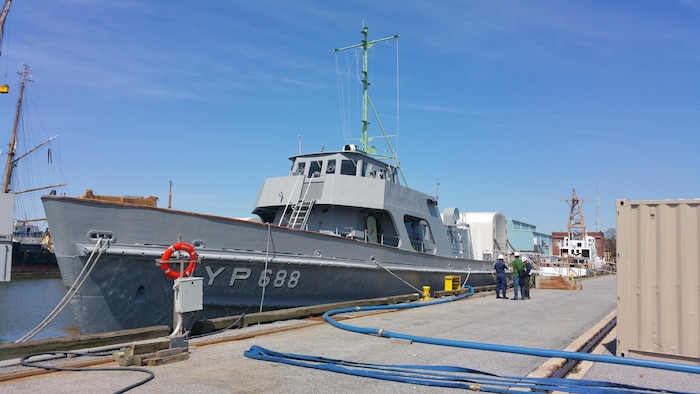 The Navy is partnering with the U.S. Coast Guard (USCG) to execute a Service Life Extension Plan on up to five of the Yard Patrol (YP) 676 Class Training Craft.   The maintenance and modernization work will be performed at the USCG Yard in Baltimore, Maryland and will allow the midshipmen at the U.S. Naval Academy (USNA) to continue training onboard these craft. YP 688 is the first craft to arrive for modernization.