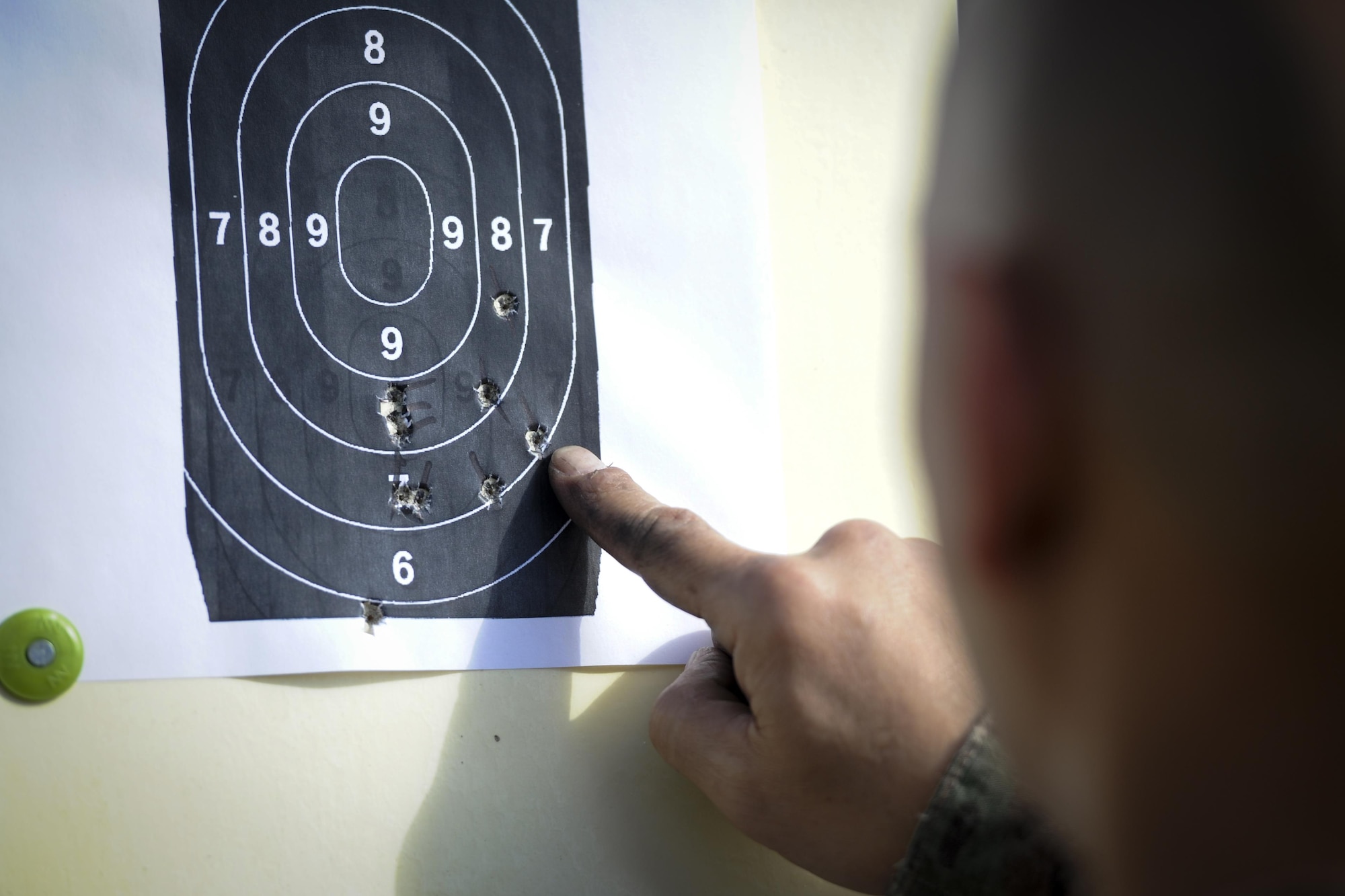 Col. Rene Leon, the maintenance division chief at Air Force Special Operations Command, assesses his target during the Excellence in Competition event at Hurlburt Field, Fla., April 4, 2017. The 1st Special Operations Security Forces Squadron hosted a rifle competition in which the top ten percent will be awarded an Excellence in Competition Rifleman Badge. (U.S. Air Force photo by Airman 1st Class Dennis Spain)