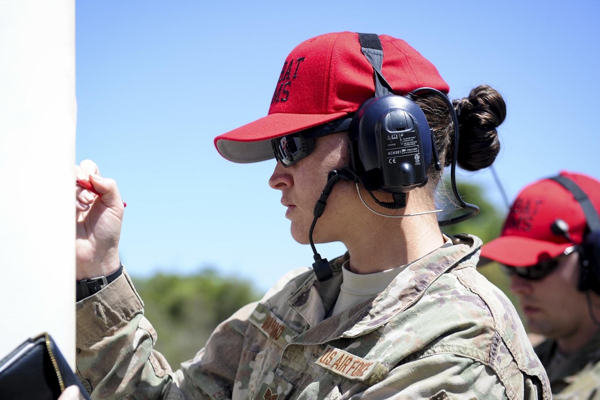 Staff Sgt. Elizabeth Marino, the NCO in charge of Combat Arms Training and Maintenance with the 1st Special Operations Security Forces Squadron, counts a shooter’s score during a rifle competition at Hurlburt Field, Fla., March 6, 2017. The 1st SOSFS hosted the Excellence in Competition event in which the top 10 percent will be awarded an Excellence in Competition Rifleman Badge. (U.S. Air Force photo by Airman 1st Class Dennis Spain)