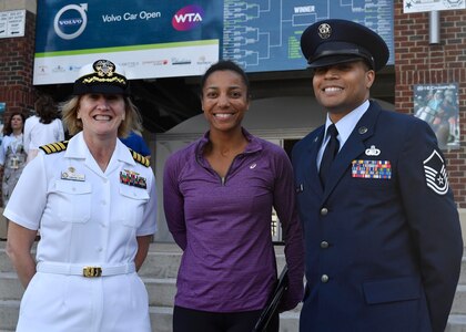 U.S. Navy Capt. Elizabeth Maley, left, Naval Health Clinic Charleston commader, and Master Sgt. Toby Housey, right, 315th Airlift Wing Equal opportunity superintendent, meet with Raquel Atawo, center, U.S. professional tennis player, during military appreciation night at the Volvo Car Stadium, April 6, 2017. Maley, Housey and the Joint Base Charleston Honor Guard represented JB Charleston with the coin toss, singing of the national anthem and posting of colors.