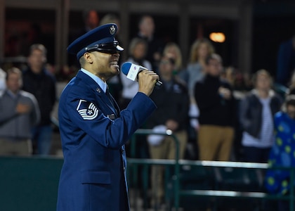 U.S. Air Force Master Sgt. Toby Housey, 315th Airlift Wing Equal opportunity superintendent, sings the national anthem during military appreciation night at the Volvo Car Stadium, April 6, 2017. Housey, U.S. Navy Capt. Elizabeth Maley, Naval health Clinic Charleston commander, and the Joint Base Charleston Honor Guard represented JB Charleston with the coin toss, singing of the national anthem and posting of colors.