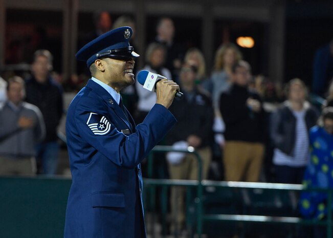U.S. Air Force Master Sgt. Toby Housey, 315th Airlift Wing Equal opportunity superintendent, sings the national anthem during military appreciation night at the Volvo Car Stadium, April 6, 2017. Housey, U.S. Navy Capt. Elizabeth Maley, Naval health Clinic Charleston commander, and the Joint Base Charleston Honor Guard represented JB Charleston with the coin toss, singing of the national anthem and posting of colors.