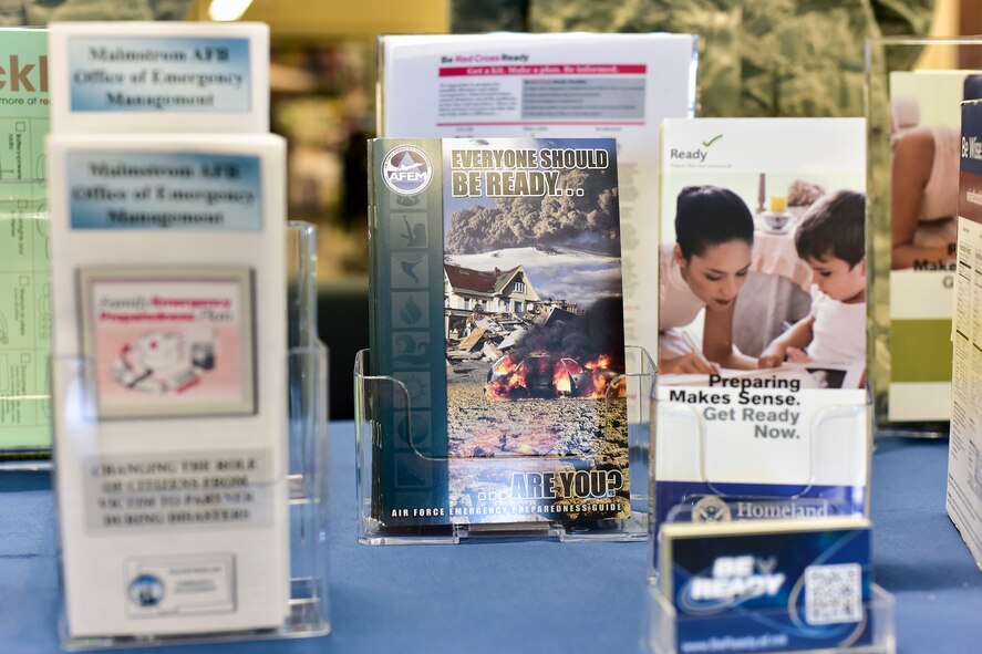 The 341st Civil Engineer Squadron’s readiness and emergency management flight has an information booth setup at the Exchange April 11, 2017, at Malmstrom Air Force Base, Mont. As part of this year’s America’s PrepareAthon!, held every spring and fall, the emergency management flight is hosting different events around base to help spread awareness and ensure Airmen and their families are ready for any disaster Montana may throw at them. (U.S. Air Force photo/Master Sgt. Chad Thompson)