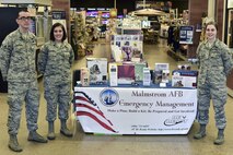 Airman 1st Class Ismael Zayas Ramos, left, Airman 1st Class Kelly LeMoine and Airman 1st Class Baylee Watercutter, all assigned to the 341st Civil Engineer Squadron’s readiness and emergency management flight, pose for a photo April 11, 2017, at Malmstrom Air Force Base, Mont. As part of this year’s America’s PrepareAthon!, held every spring and fall, the emergency management flight is hosting different events around base to help spread awareness and ensure Airmen and their families are ready for any disaster Montana may throw at them. (U.S. Air Force photo/Master Sgt. Chad Thompson)