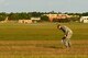 U.S. Air Force Senior Airman Anthony Nguyen, 20th Operations Support Squadron airfield management shift lead, removes foreign-object debris (FOD) from the flightline at Shaw Air Force Base, S.C., April 12, 2017. FOD can cause damage to F-16CM Fighting Falcons if drawn into the engine, endangering pilots’ lives. (U.S. Air Force photo by Airman 1st Class Kathryn R.C. Reaves)