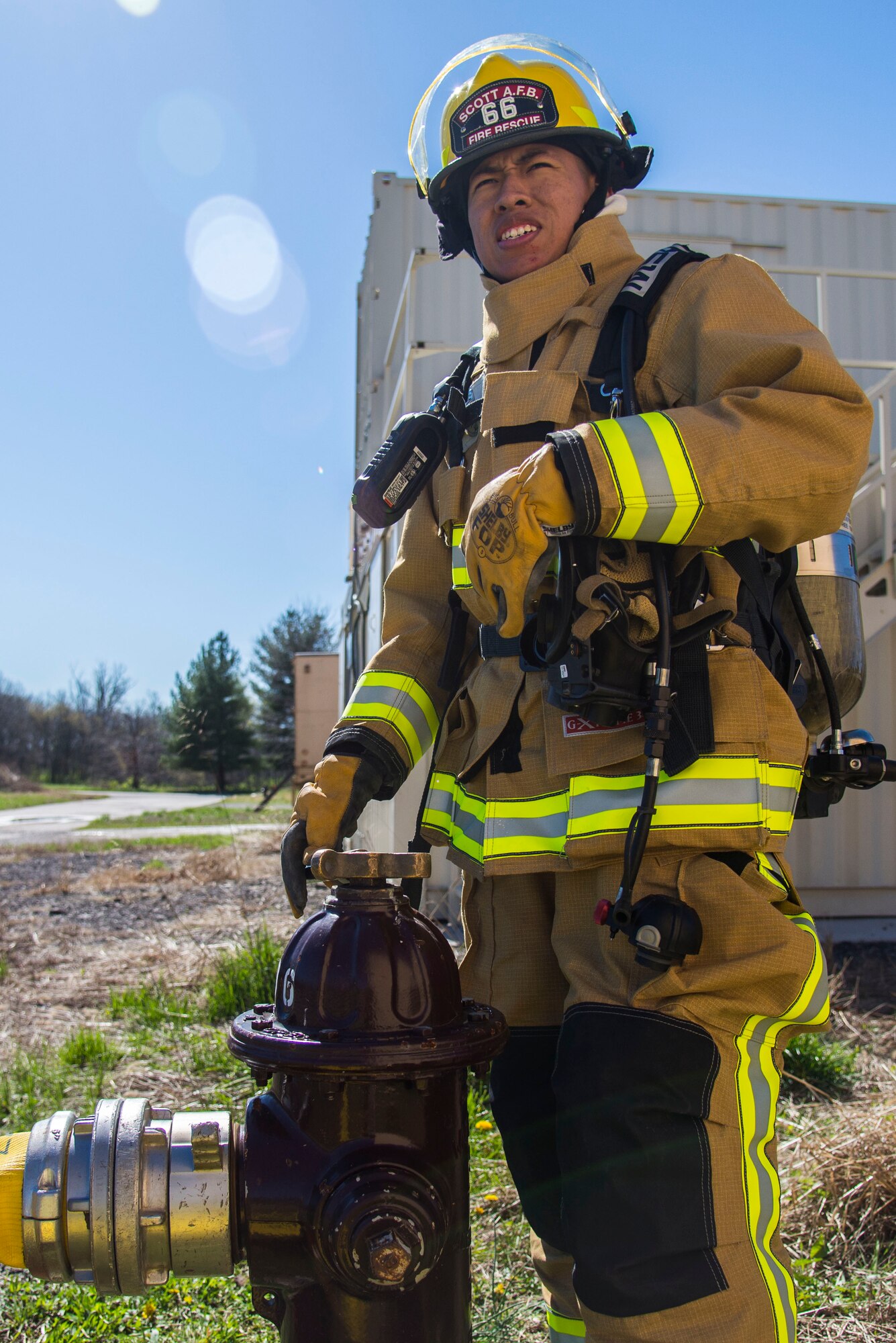 Firefighters with the 375th Civil Engineer Squadron performed drills in new structural gear at Scott. The new gear has a constructed outer shell capable of withstanding 1,100-1,200 degrees before degrading to the point of losing complete physical integrity. The thermal liner consist of two primary components that allow better moisture absorbency and allows sweat to be removed. Helmets are made smaller to offset risks associated with confined spaces or while wearing the self-contained breathing apparatus, and footwear has a steel toe with safety toe protection.