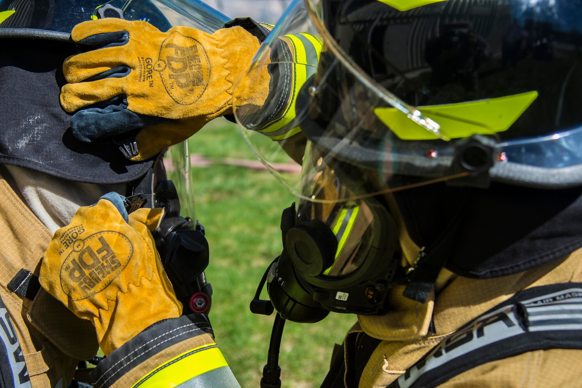 Firefighters with the 375th Civil Engineer Squadron performed drills in new structural gear at Scott. The new gear has a constructed outer shell capable of withstanding 1,100-1,200 degrees before degrading to the point of losing complete physical integrity. The thermal liner consist of two primary components that allow better moisture absorbency and allows sweat to be removed. Helmets are made smaller to offset risks associated with confined spaces or while wearing the self-contained breathing apparatus, and footwear has a steel toe with safety toe protection.