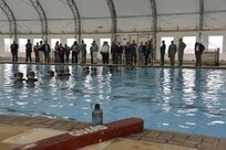 Charleston civic leaders and Joint Base Charleston leadership watch as Airmen train with the 342th Training Squadron in underwater scenarios as part of the Battlefield Airman entry-level course, March 16, 2017. The 342nd TRS’s mission is to prepare pararescue, combat control, special operations weather, and Tactical Air Control Party Airmen to thrive in uncertain environments around the world.