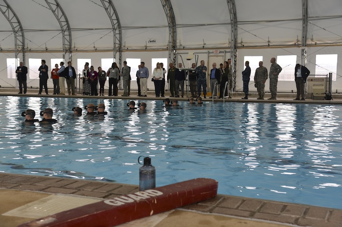Charleston civic leaders and Joint Base Charleston leadership watch as Airmen train with the 342th Training Squadron in underwater scenarios as part of the Battlefield Airman entry-level course, March 16, 2017. The 342nd TRS’s mission is to prepare pararescue, combat control, special operations weather, and Tactical Air Control Party Airmen to thrive in uncertain environments around the world.