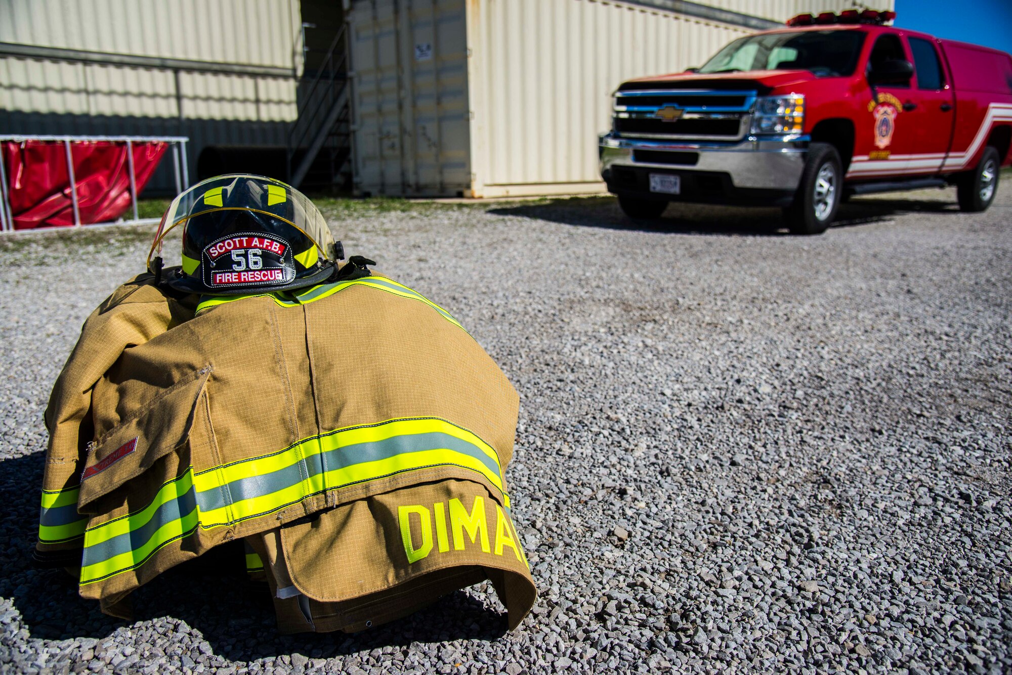Firefighters with the 375th Civil Engineer Squadron performed drills in new structural gear at Scott. The new gear has a constructed outer shell capable of withstanding 1,100-1,200 degrees before degrading to the point of losing complete physical integrity. The thermal liner consist of two primary components that allow better moisture absorbency and allows sweat to be removed. Helmets are made smaller to offset risks associated with confined spaces or while wearing the self-contained breathing apparatus, and footwear has a steel toe with safety toe protection.