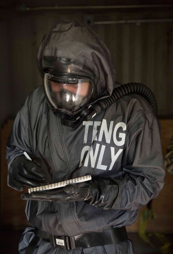 TUNNEL HILL, Ga. – Lance Cpl. Steven Deason, a hazmat technician with Chemical Biological Radiological Nuclear Platoon, Combat Logistics Regiment 4, 4th Marine Logistics Group, Marine Forces Reserve, documents a potentially dangerous building during a CBRN training exercise at Volunteer Training Site, Catoosa, Tunnel Hill, Ga., April 4, 2017. While in an area where the circumstances of the environment are unknown, the CBRN Marines document everything they see because they are the first reconnaissance team to access the area.  Photos and sketch pads are used to document details collected from every room to brief the rest of their platoon after they return to the combat operations center.   (U.S. Marine Corps photo by Cpl. Devan Alonzo Barnett/Released)
