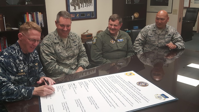 From left to right: U.S. Navy Capt. Robert Hudson, Naval Support Activity Charleston commander, U.S. Air Force Col. Robert Lyman, 628th Air Base Wing commander, U.S. Air Force Col. Gregory Gilmour, 315th Airlift Wing commander and U.S. Air Force Col. Jimmy Canlas, 437th Airlift Wing commander, sign a proclamation declaring April as Sexual Assault Awareness & Prevention Month April 4, 2017, in the Headquarters Conference Room here. SAAPM is observed across the Department of Defense annually to focus on creating an appropriate culture and eliminating sexual assault through a personal commitment from all service members at every level.
