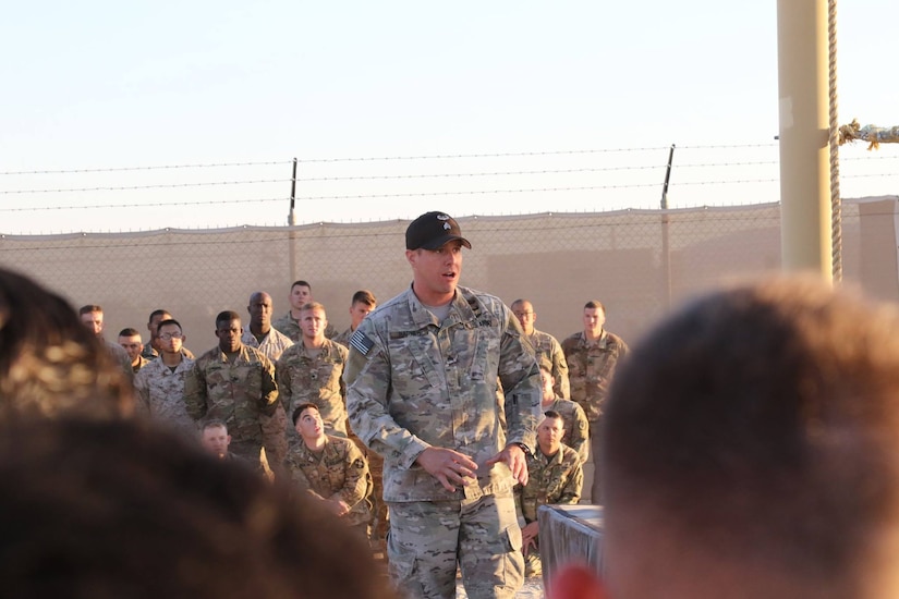 U.S. Army Sgt. Cruser Barnes, cavalry scout and air assault instructor, Army National Guard Warrior Training Center, gives instructions on how to properly navigate the ‘Tough One’ obstacle, during day zero of U.S. Army Central’s first Air Assault Course, April 4, 2017, at Camp Buehring, Kuwait. The ‘Tough One’ obstacle includes rope, net climbing and walking along wooden planks. It is one of two obstacles candidates must pass in order to continue forward on day zero. The Air Assault Course is a 12-day class that allows U.S. military personnel in the USARCENT theater of operations the unique opportunity to become air assault qualified, while deployed outside the continental United States.