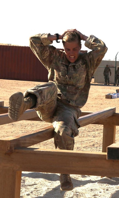 U.S. Army 1st Lt. Katlyn Lehmann, human resource officer, 258th Human Resource Company, navigates the high-step-over obstacle during day zero of U.S. Army Central’s first Air Assault Course, April 4, 2017, at Camp Beuhring, Kuwait. The Air Assault Course is a 12-day class that allows U.S. military personnel in the USARCENT theater of operations the unique opportunity to become air assault qualified, while deployed outside the continental United States.