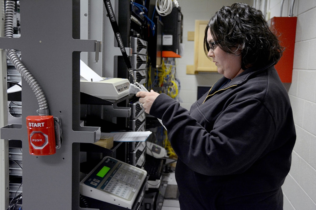 The Greater Richmond ARC contracted emergency dispatcher prepares the phone lines in the Emergency Communications Center at Defense Supply Center Richmond, Virginia, during a tornado drill March 21, 2017.