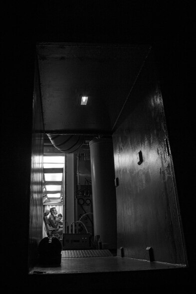 Missileers with the 321st Missile Squadron run through the test sequence document during the Simulated Electronic Launch-Minuteman test inside the launch control center at a missile alert facility in the 90th Missile Wing's missile complex, Neb., April 11, 2017. The missileers worked heavily in conjunction with missile maintainers to conduct a test of Minuteman III weapon system components. A SELM test proves the ICBM weapon system's effectiveness in a safe and secure manner. (U.S. Air Force photo by Staff Sgt. Christopher Ruano)