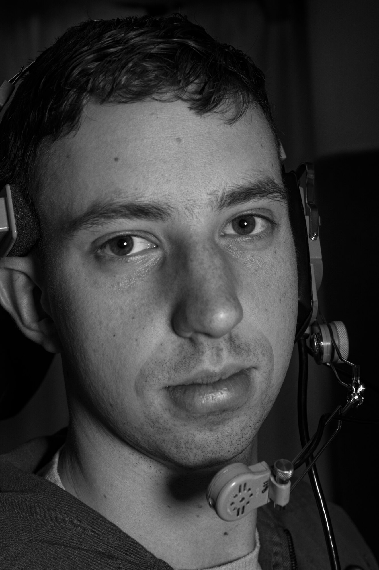 1st Lt. Paul Lee, 321st Missile Squadron missile combat crew commander, poses for a photo during a Simulated Electronic Launch-Minuteman test inside the launch control center at a missile alert facility in the 90th Missile Wing's missile complex, Neb., April 11, 2017. Lee's hometown is Glasgow, Scotland, and he has served with the 321st MS for two years. (U.S. Air Force photo by Staff Sgt. Christopher Ruano)