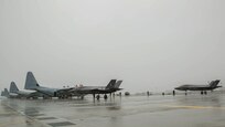 Two U.S. Marine Corps F-35B Lightning II aircraft with Marine Fighter Attack Squadron (VMFA) 121 refuel using a KC-130J Hercules with Marine Aerial Refueler Transport Squadron (VMGR) 152 during aviation delivered ground refueling training at Marine Corps Air Station Iwakuni, Japan, April 11, 2017. The ADGR marked the first evolution of this form of refueling for VMFA-121’s F-35B Lightning II aircraft, and it increases the squadron’s ability to refuel by C-130 aircraft in austere locations when other resources may not be available.  