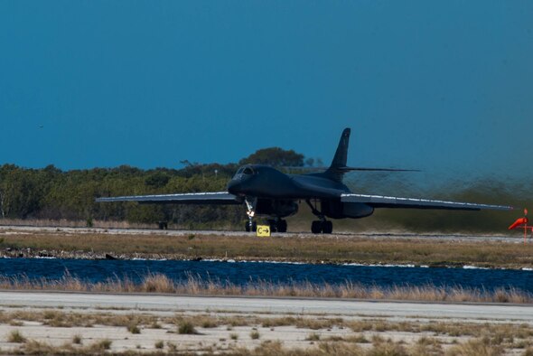 A B-1 Lancer waits for flight clearance at the end of the runway on Boca Chica Naval Air Station, Key West Fla., March 22, 2017. Airmen from the 489th Bomb Group and the 7th Bomb Wing supported the Drug Enforcement Agency, FBI, Coast Guard and 15 other government agencies in the fight against illicit drugs. (U.S. Air Force photo by Staff Sgt. Jason McCasland/released)